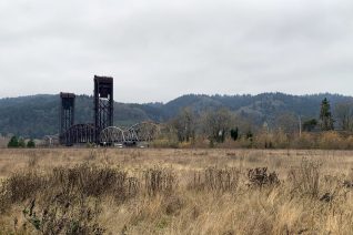 McCormick & Baxter site with the Burlington Bridge in the background